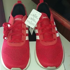 Brand new red pair of men's adidas. Size 9 1)2.